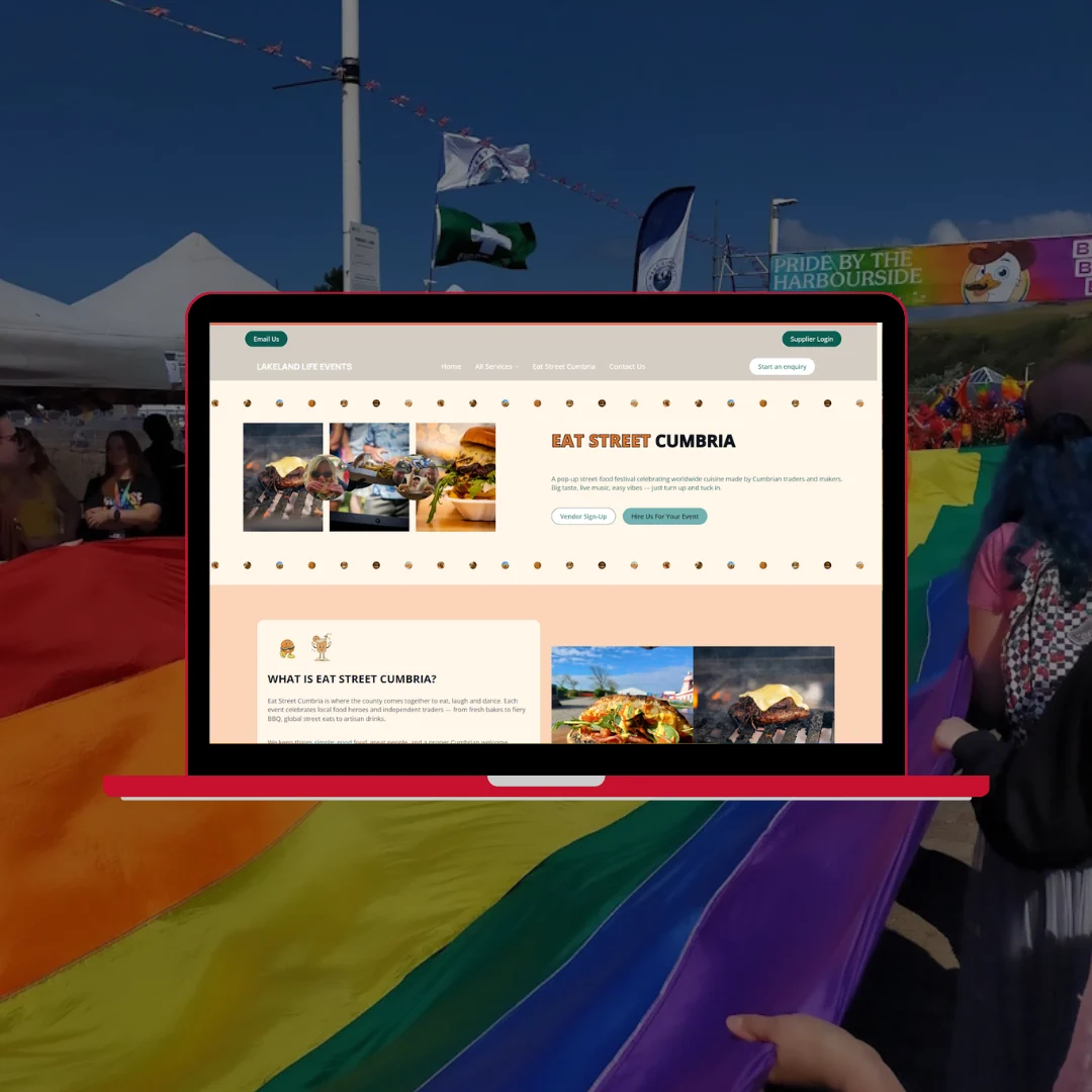 Laptop showing the Eat Street Cumbria street food festival website with food images and event information, against the backdrop of Pride by the Harbourside festival