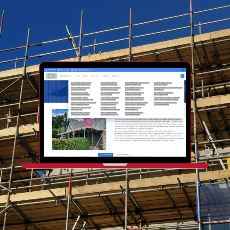 Laptop displaying the Total Access Scaffolding portfolio page with scaffolding project listings across Cumbria