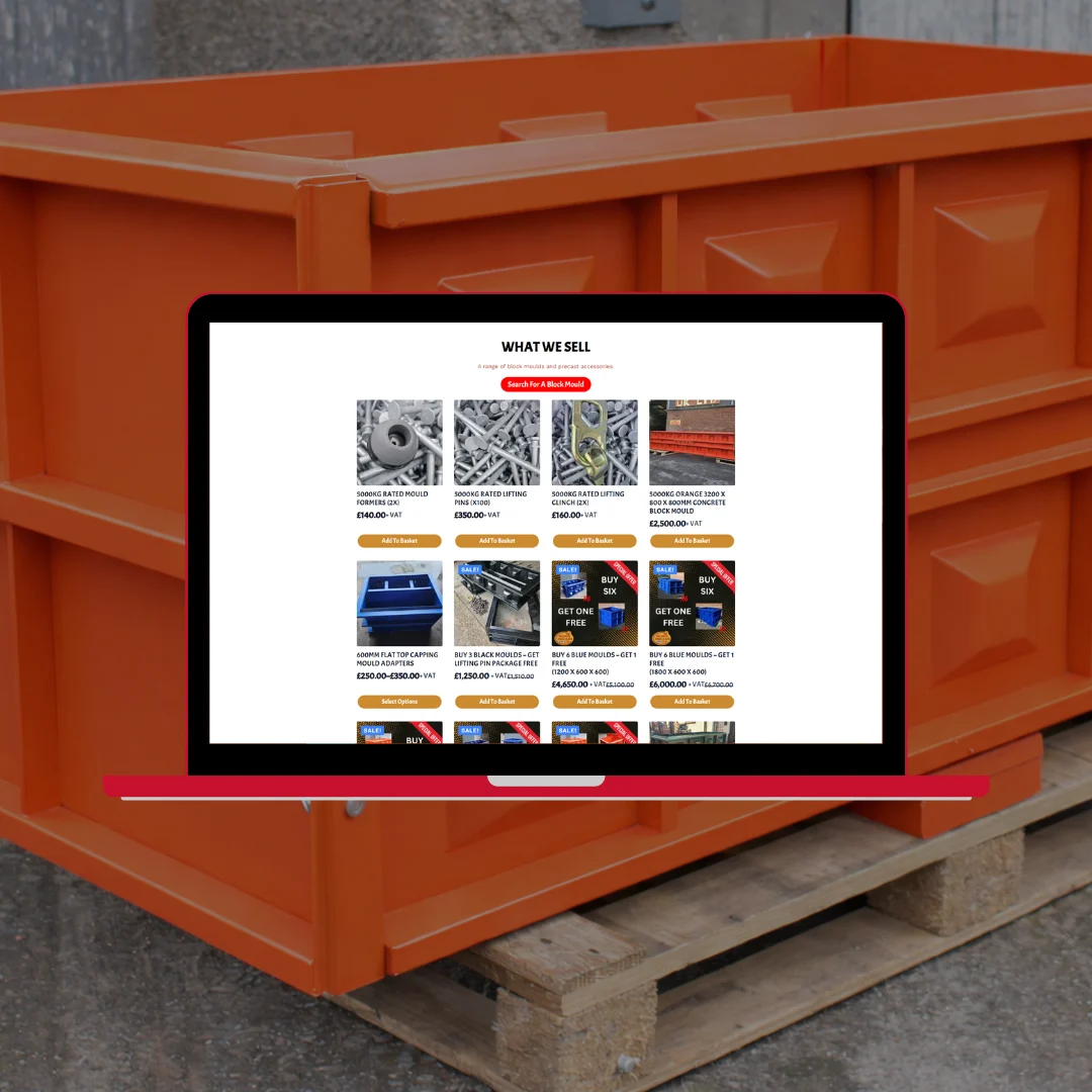 Block Moulds UK Ltd website products page showing concrete block mould product grid with red and grey moulds