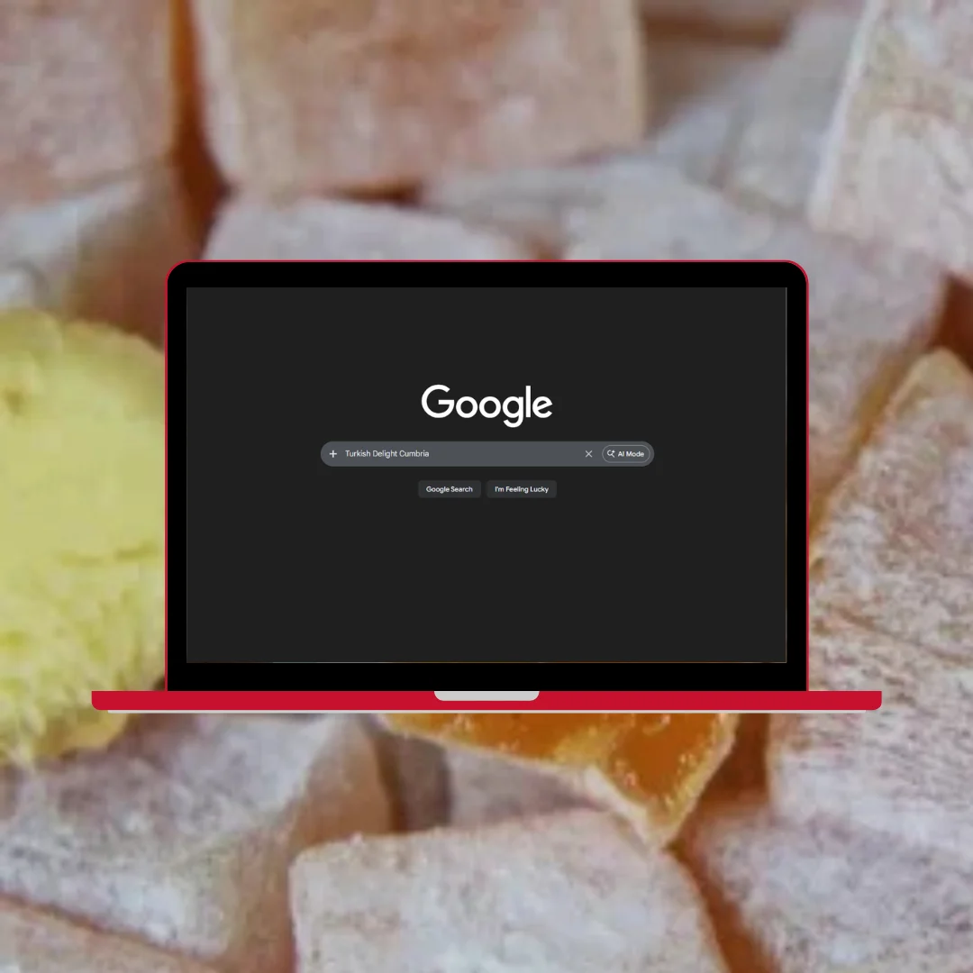 Laptop screen showing Google search for Turkish Delight Cumbria with vanilla Turkish delight sweets in the background